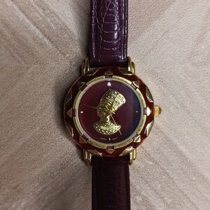 Vintage Avon Queen Nefertiti burgundy and gold details maroon leather band watch